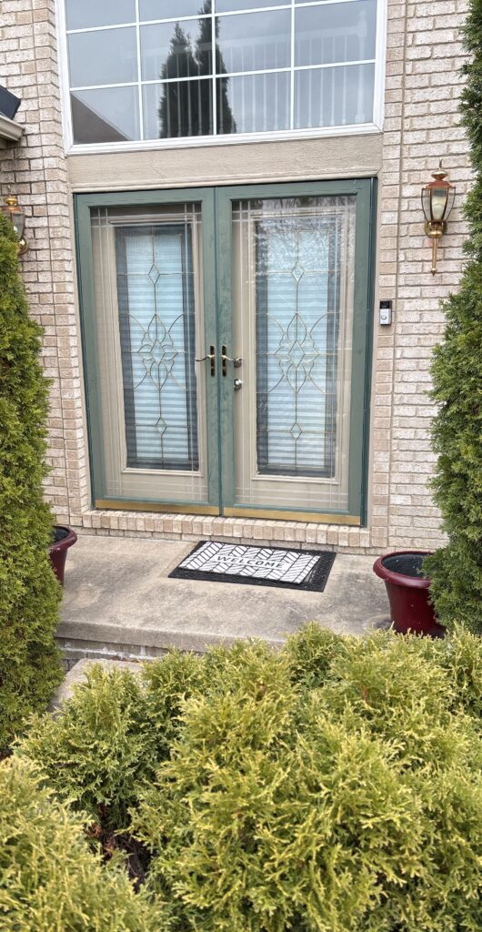 new door with windows installed in a home