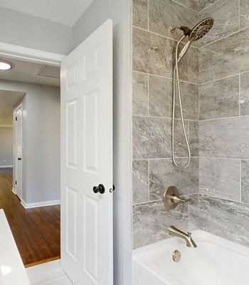 Neutral tones that brighten smaller bathrooms