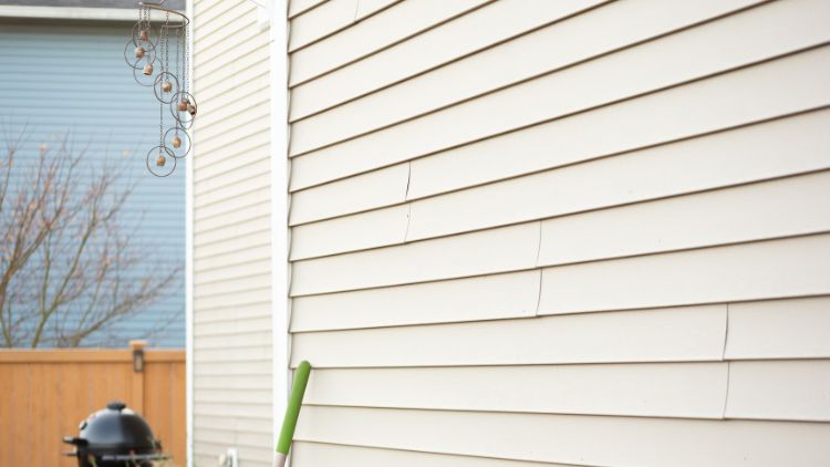 https://handymanconnection.com/calgary/wp-content/uploads/sites/14/2025/08/Should-You-Repair-Or-Replace-Your-Homes-Siding.jpg