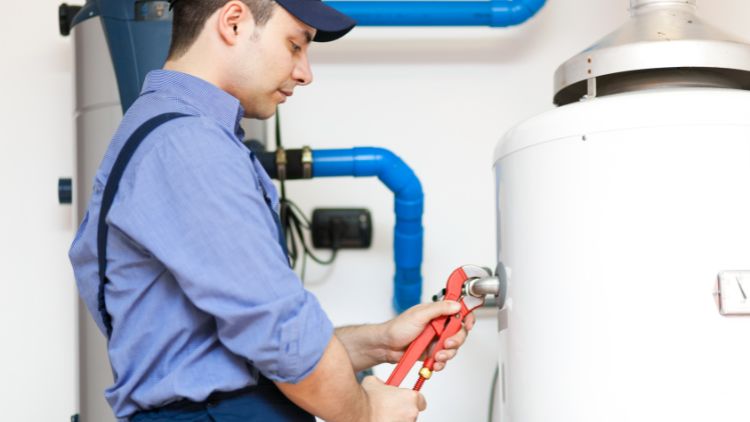 https://handymanconnection.com/calgary/wp-content/uploads/sites/14/2025/08/When-And-How-To-Replace-A-Water-Heater.jpg