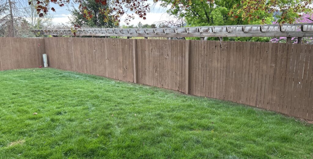 new wooden fence installed by our handymen for Sandy, UT