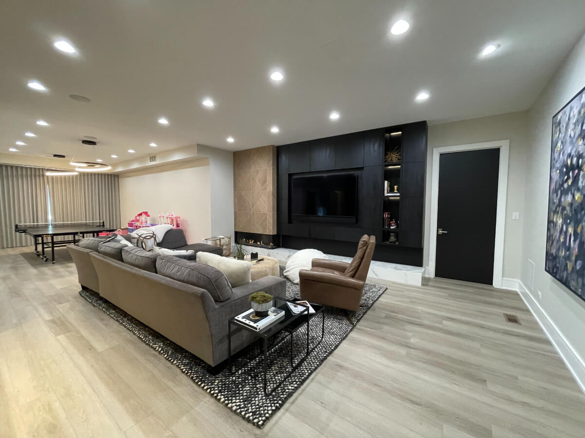basement remodel completed with new flooring and drywall installed by our handymen