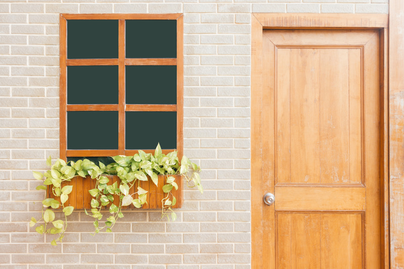 https://handymanconnection.com/franchise-ca/wp-content/uploads/sites/3/2020/05/Canva-Photo-of-Wooden-Door-Near-Window.jpeg