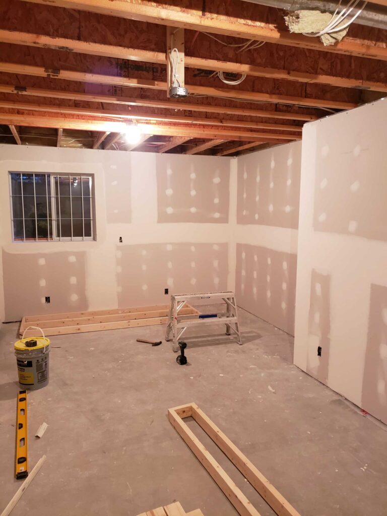 basement drywall installation project in Holt, MI