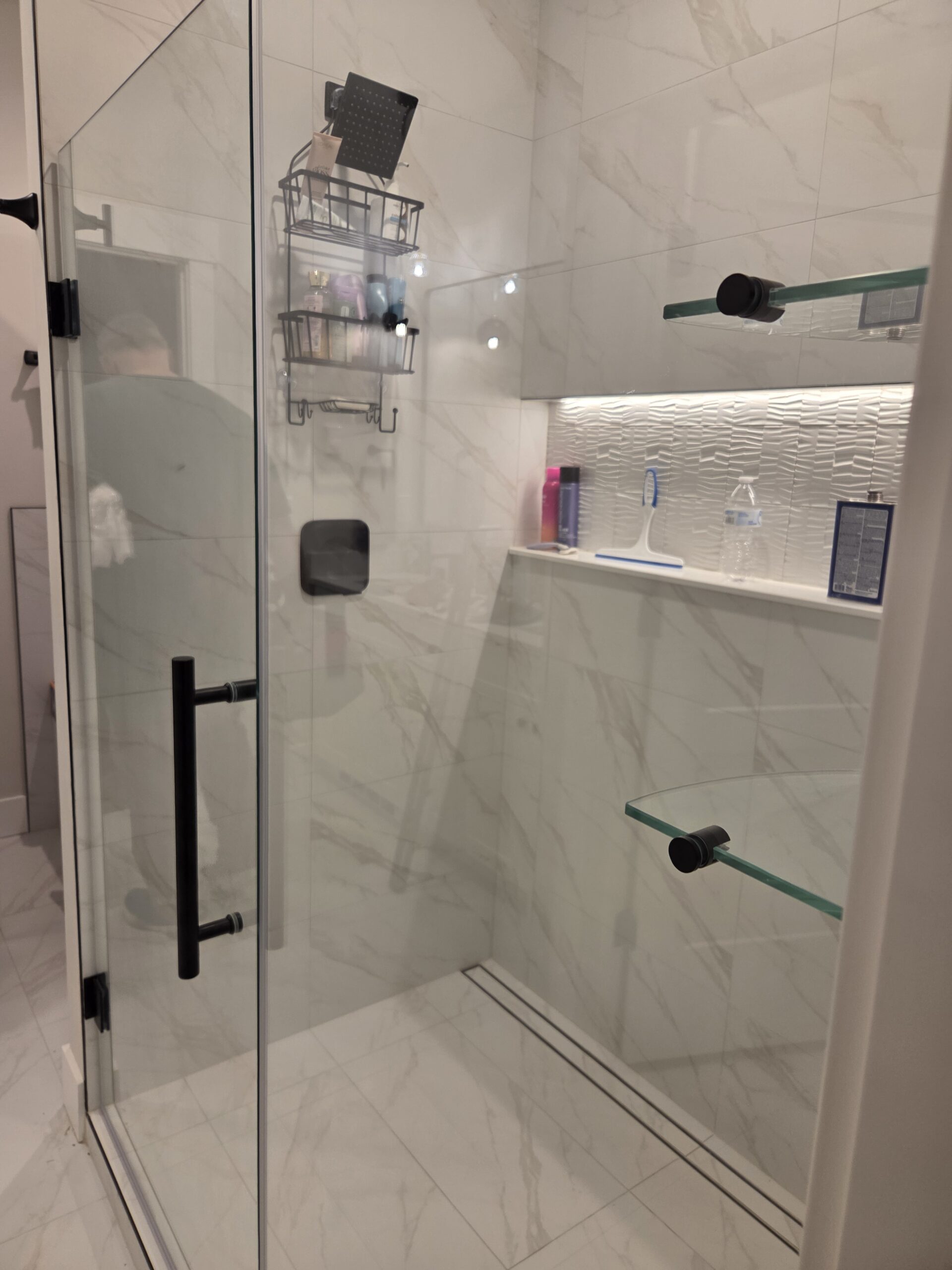 new shower remodel done by our craftsmen with new fixtures and tile installed