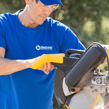 craftsman using power saw