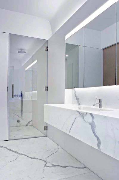 https://handymanconnection.com/pasadena/wp-content/uploads/sites/39/2023/03/ultra-modern-marble-white-bathroom-ideas.jpg