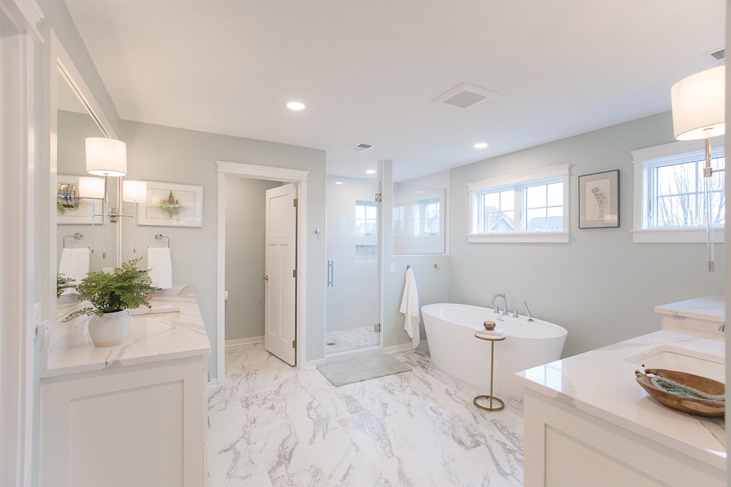 https://handymanconnection.com/pasadena/wp-content/uploads/sites/39/2023/04/Interior-Impressions-Woodbury-MN-Rejuvenated-Remodel-Main-Bathroom-Marble-Floors-Freestanding-Tub-Walk-In-Glass-Shower-White-1-e92292da8f3c498882d36ded047f10bd.jpg