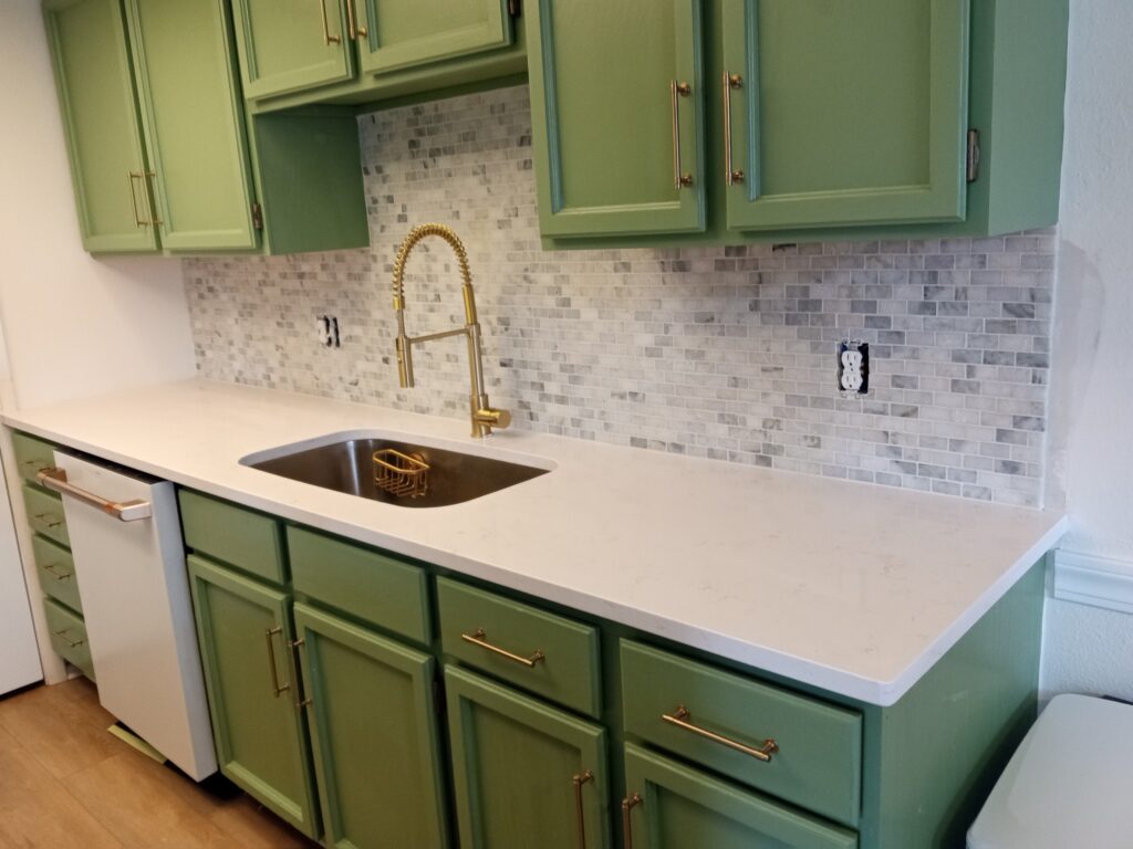 remodeling project completed with new cabinets and tile backsplash in Southside, FL
