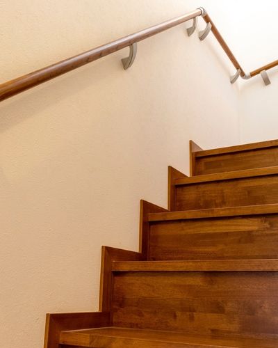 Wooden stairs and handrail