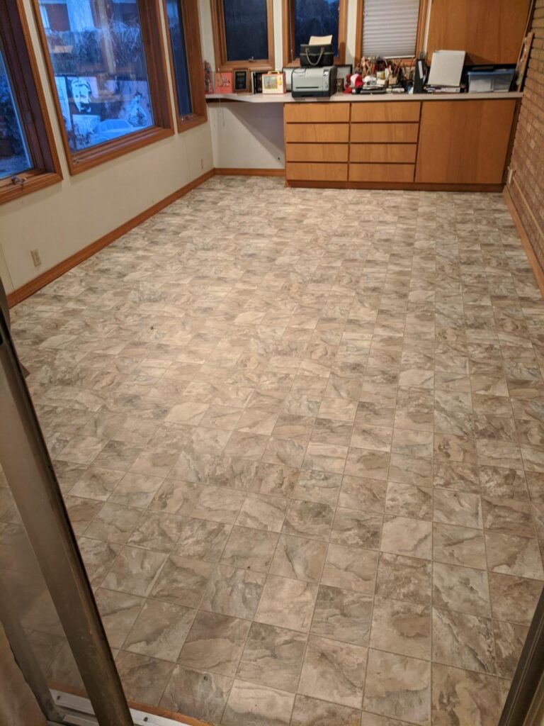 tile floors installed in a living room home